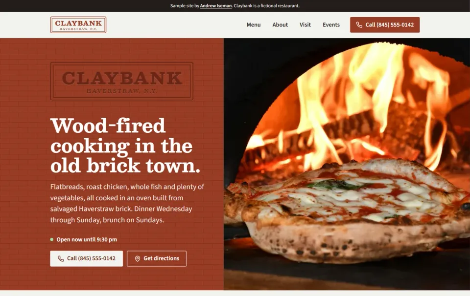 Claybank restaurant homepage with a wood-fired oven photo and the tagline "Wood-fired cooking in the old brick town"