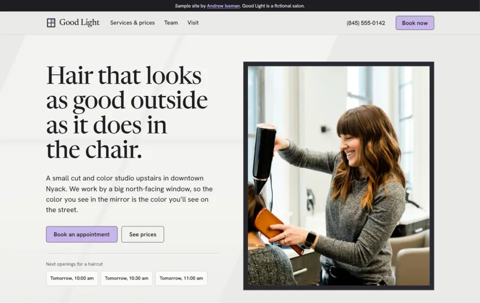 Good Light Hair Studio homepage with a stylist blow-drying a client by a big window